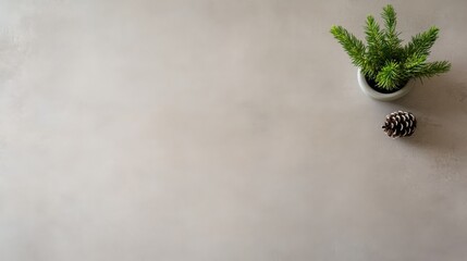 Aufkleber - A light wooden surface covered in snow features a solitary pine cone and a sprig of evergreen, with ample space for adding text on the right side