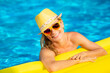 © Sunny studio - Happy young woman having fun in swimming pool on summer vacation