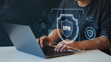 secure your digital life: vpn technology & cybersecurity protection. person using laptop with secure