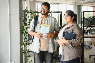 Wall Mural - Cheerful Indian asian young college students or friends