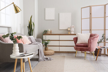 Wall Mural - Armchair, chest of drawers and cozy sofa in living room