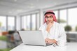 © BillionPhotos.com - A saudi character man sitting working in office