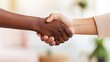 © Phunnada - Diverse Hands Shaking in a Professional Environment for Collaboration