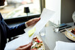 © Boris Jovanovic/Stocksy - Revising the paperwork in the restaurant