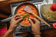 © Carlos Gonzales/Stocksy - Preparing vegetarian food
