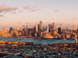 © Yakov Knyazev/Stocksy - New York Panorama. Waterfront Skyline at Sunset, shot from Jersey city