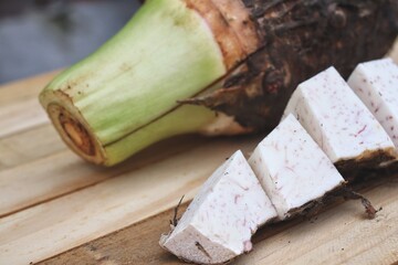 Wall Mural - Fresh taro raw on wood background