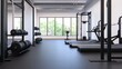 © chusnul - Modern gym interior featuring various exercise equipment, weight, and large window with greenery outside