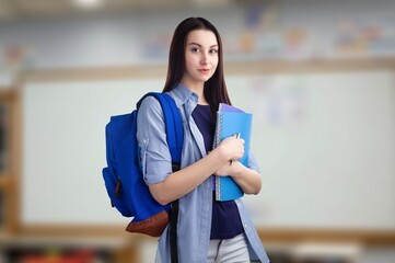 Canvas Print - Female student posing at school background