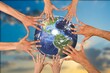 © BillionPhotos.com - Group of multiethnic people holding earth globe
