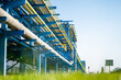 © ma yic/Stocksy - Industrial Pipe Rack