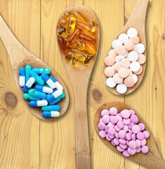 Wall Mural - Different medical capsules, vitamin pills