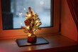 © Alexey Kuzma/Stocksy - Christmas tree with lights  on the laptop