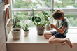 © Irina Polonina/Stocksy - Caring for Green Friends in a Sunny Apartment
