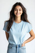 © PRASANNAPIX - A Indian female model, smile, in light jeans and blue T-shirt in the casual style of, white background