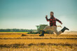 © Volodymyr - Harvest success. Excited farmer jumping in the wheat field. Good harvest. Happy farmer jump and celebrating the harvest. Jumping with joy in a golden wheat field. Great harvest. Excited farmer