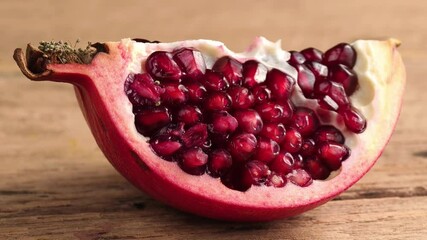 Wall Mural - Ripe pomegranate on wooden 