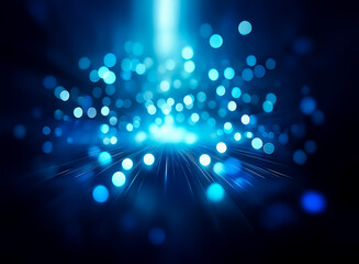 Wall Mural - a burst of radiant blue light illuminates the dark backdrop, creating a bokeh effect with glowing ci