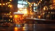 © izzuddin - A frosty glass of beer sits on a rustic wooden table, illuminated by warm ambient lights in a cozy bar