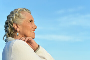 Canvas Print - Portrait of a beautiful elderly woman in the park