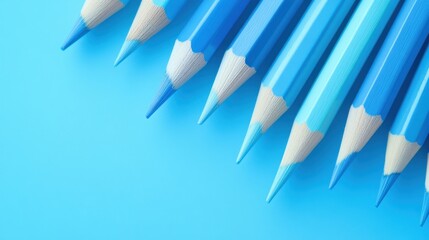 Poster - Elegant pastel blue pencil strokes create a stunning gradient against a vibrant blue background showcasing creativity and artistry