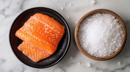 Wall Mural - a bowl of salt and a piece of salmon