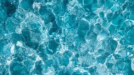 Wall Mural - stunning turquoise water texture with shimmering reflections