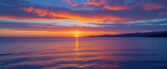 Wall Mural - Vibrant coastal sunset with colorful sky reflections over tranquil waters creating a stunning vista and ample space for text overlay.