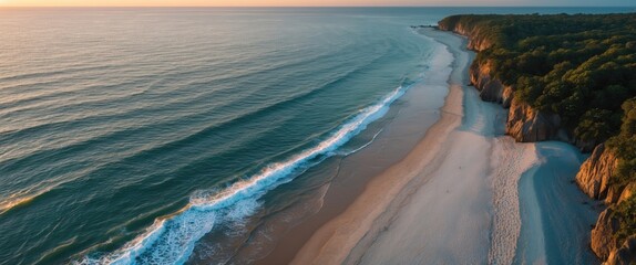 Wall Mural - Aerial View of Serene Beach at Sunset with Gentle Waves and Lush Green Shoreline Ideal for Text Overlay and Promotional Use