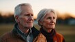 © Satisgitfied - Elderly Couple Enjoying a Scenic Sunset Together Outdoors