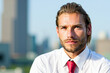 © Minerva Studio - Portrait of businessman posing outdoors in urban environment