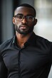 © Alla - A person wearing glasses and a black shirt, suitable for portrait or profile use