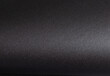 © valiantsin - Elegant black paper background with a smooth, textured surface, monochrome design creating a dramatic and stylish effect, perfect for modern and artistic applications.