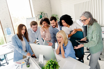 collaboration among diverse professionals working together in a modern office space