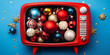 © Siasart Stock - Red Retro TV Filled with Colorful Christmas Ornaments on Blue Background with Gold Glitter Stars