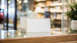 © Mahmud - Modern Storefront Mockup with Blank Business Card on Wooden Counter