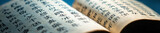 Abstract Ancient Chinese words on old book. Wide banner.