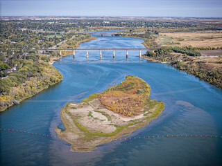 Wall Mural - River with a bridge and a small island in the middle