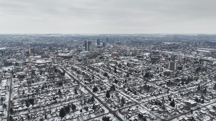 Wall Mural - Breathtaking drone view of Snow-covered roads, highways, and cloudy sky in Waterloo, Ontario, Canada