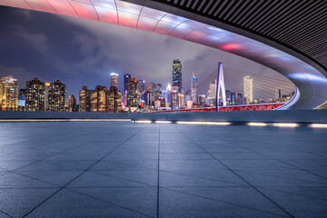 Wall Mural - empty square floor and bridge with city skyline at night in chongqing