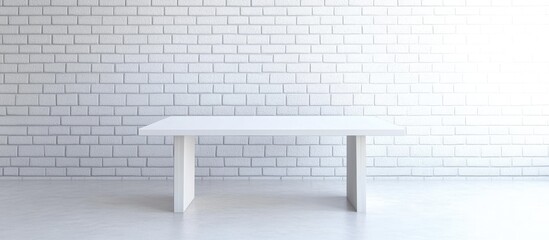 Fototapete - Minimalist white wooden desk centered in a bright, airy space with a clean white brick wall, creating a sleek and modern workspace atmosphere.