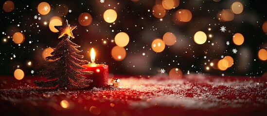 Poster - Warm festive red background adorned with golden bokeh lights showcases a candle and miniature Christmas tree with drifting snowflakes throughout the winter season