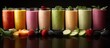 © Ahmad - Colorful array of smoothies in clear glasses with vibrant fruits and vegetables on dark background highlighting fresh ingredients and ample copy space.