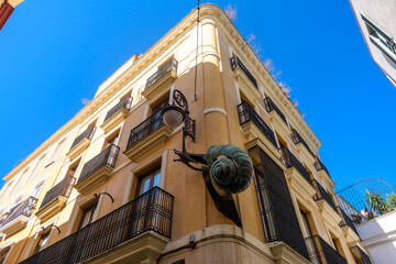 Wall Mural - Seville, Spain - August 01, 2024: Walking the streets of the old town of Seville, Spain.