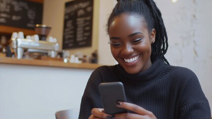 Canvas Print - This image captures a delightful moment in a stylish, modern coffee shop. A woman with a radiant smile is seen holding up her phone to take a picture. The café's interior is beautifully designed and