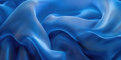 Leinwandbilder - Translucent aquamarine fabric texture showcasing soft, wavy layers with a smooth sheen, featuring shades of blue and hints of multicolor highlights.