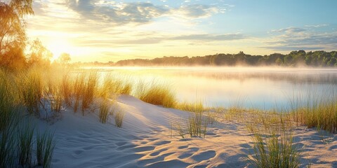 Aufkleber - Golden sand dunes with lush green grasses by a tranquil river at sunrise, soft morning light reflecting on calm water, mist hovering above.
