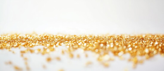 Wall Mural - gold glitter texture on a clean white background ideal for elegant designs and festive occasions. pe