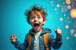© PremiumPhoto - Little boy is excited with his new backpack