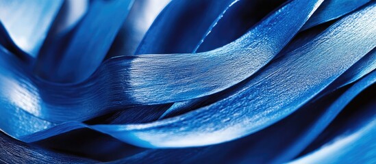 Leinwandbilder - Textured waves of vibrant blue paint creating an artistic background for creative design and abstract artwork concept